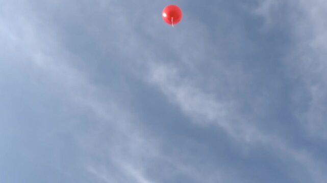 Red Balloon Accidentally Let Go - Blue Sky