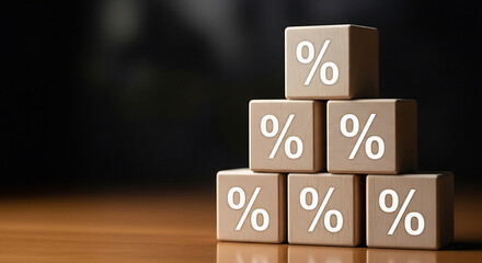 Stack of wooden blocks with percentage signs on them