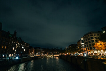 Fototapeta premium Night view of the canal in Hamburg, Germany - 1 oct 2025