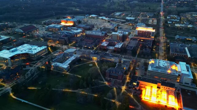 An impressive aerial view captures the sprawling campus of Iowa State University in Ames, Iowa, as twilight settles.