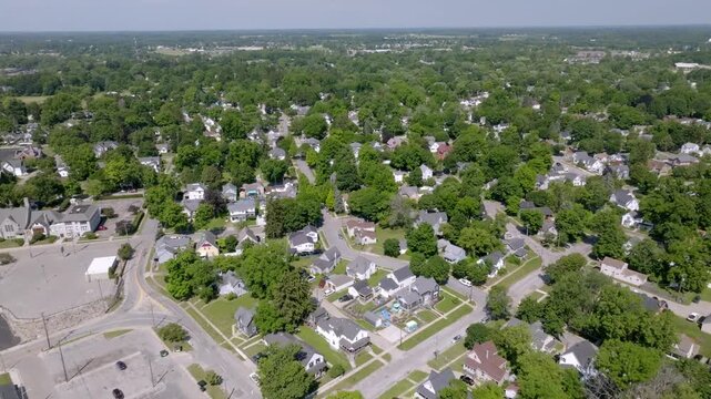 Lapeer, Michigan neighborhood homes with drone video moving in.