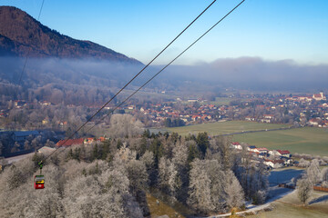 The Kampenwandbahn cable car in Aschau, Bavaria, with breathtaking views of the town and the winter landscape.