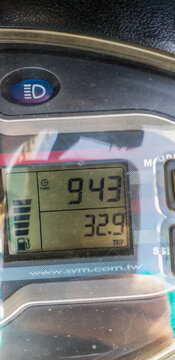 illustrative editorial SYM scooter dashboard, 150cc Motorbike speedometer odometer fuel indicator, trip counter RPM clock, 2 weal vehicle, selective focus, shallow depth, Cairo Egypt 26 Jan 2021