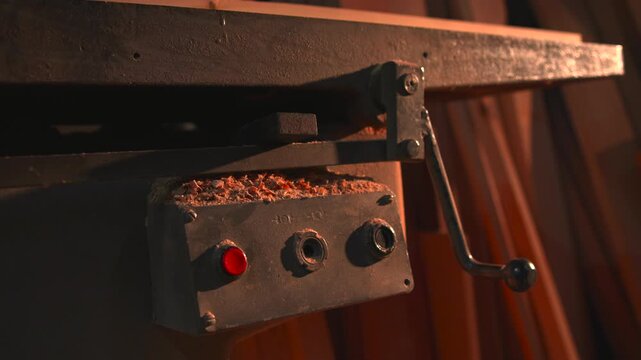 Machine Incorporates Panel Displaying Wood Shavings Along With Multiple Control Buttons For Operation. Media