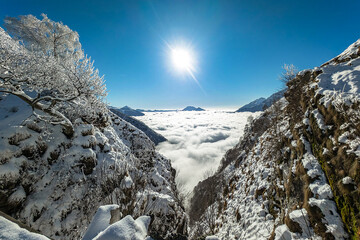 Backlight over the clouds, Como lake range, Valsassina landscape