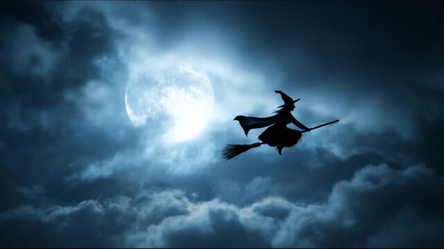 A silhouette witch glides on a broom before a bright full moon amid swirled night clouds and stars