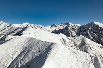 Pizzo de Tre Signori on the horizon, drone view in Valsassina, Italy landscape