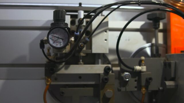 Instrument Displays Pressure Levels On Dial During Machine Warmup For Inspection And Service. Media