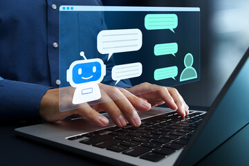 AI chat assistant. AI-powered customer support. Business process automation with conversational AI. Businessperson using laptop computer with conversational virtual assistant.