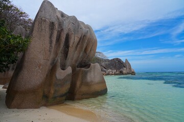 Day view of the Anse Source d Argent beach with its granite boulders on La Digue island in the Seychelles, one of the most beautiful beaches in the world