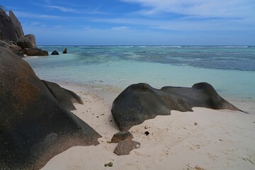 Day view of the Anse Source d Argent beach with its granite boulders on La Digue island in the Seychelles, one of the most beautiful beaches in the world