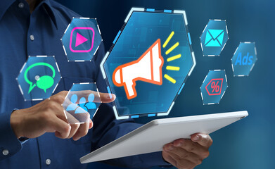 Digital marketing and internet campaigns. Marketing strategy on social media. Marketer using tablet computer to manage targeted advertising and promotions.