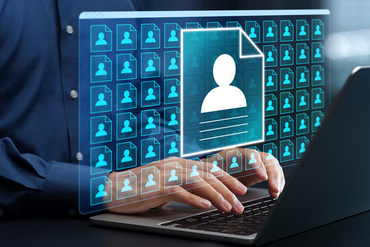 Customer data management and analysis. CRM system and database. Businessman managing customer profile and behavioral history on laptop computer.