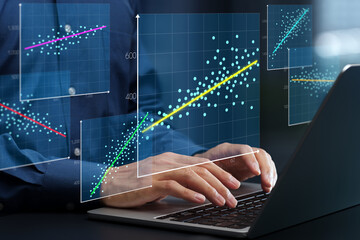 Regression analysis. Linear regression chart. Predicting trends with historical business data. Businessperson using laptop computer to make data-driven decisions.