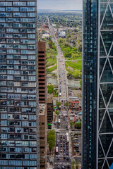 City street and bridge framed by tall office buildings