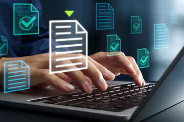 Document management and workflow solution. Approval automation system. Businessman using laptop computer to manage business files.