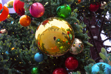 Colorful Christmas tree ornaments and ribbons in Warsaw Poland during winter holiday