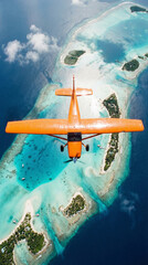 Naklejka premium Top-down aerial of an orange bush plane flying over tropical lagoons