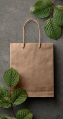 Kraft bag with green leafy vines on textured grey background