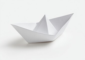 White paper origami boat on a white background