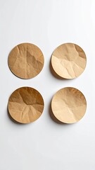 Four crumpled paper circles, brown texture, minimal