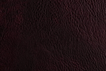 Fototapeta premium Dark brown leather texture on a surface suitable for furniture or craft projects in a creative space