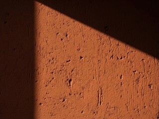 Chinese new year background Textured terracotta wall with sharp shadow edge | Chinese, red, new year, background, abstract.