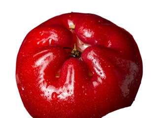 A vibrant, close-up view of a perfectly ripe, red fruit, glistening
