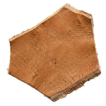 Natural brown textured leather scrap fragment isolated