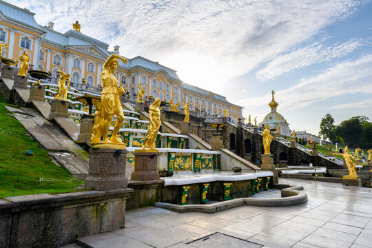 St. Petersburg, Russia - September 12, 2024: Majestic Peterhof Palace with Golden Fountains and Grand Staircase