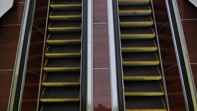 Modern metro escalators in Moscow showcasing urban transport and architecture concept