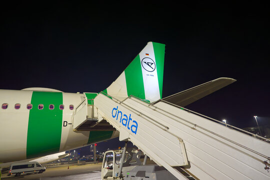Passengers deboarding Condor airplane type Airbus A321neo registration D-ANMW at Swiss Z&uuml;rich Airport on an autumn evening. Photo taken November 22nd, 2025, Zurich, Switzerland.