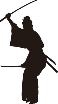 刀を持った侍の構えのシルエット