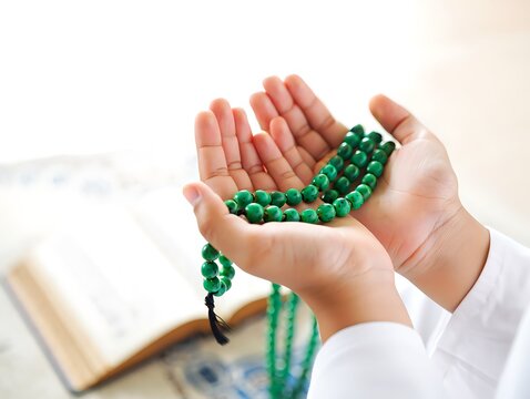 Peaceful Ramadan portrait of a Muslim child praying with tasbih beads, hands raised in dua, soft light, sacred atmosphere, Islamic faith, devotion, spirituality, tradition.