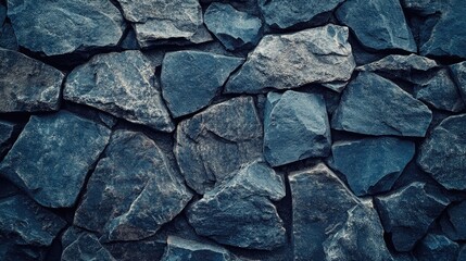 Fototapeta premium Blue stone background. Toned rock texture. Close-up. Dark blue grunge background