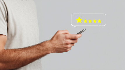 Close up of man hand using smartphone with five star rating icon, customer satisfaction and product review concept, online feedback and reputation management, high quality service.