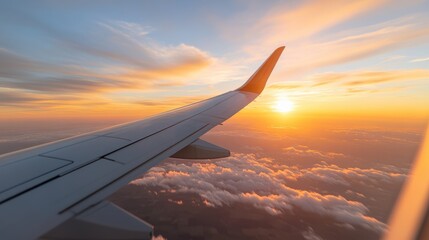 Glimmers of sunrise as the airplane glides through the vibrant sky