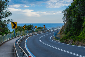 Photo taken at Sea Cliff Bridge in December 2025, showing the iconic coastal bridge and ocean views, with people enjoying walking and sightseeing along the coast.