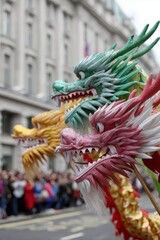Dragon dance heads in a row bringing good fortune and celebrating chinese new year in london street parade