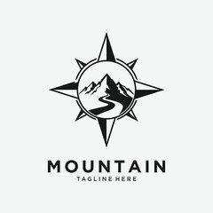 Mountain peak logo design and winding road on a compass