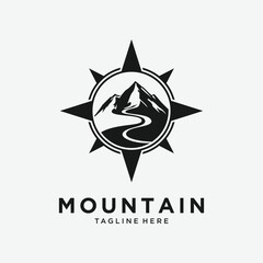 Mountain compass logo with peaks and winding roads