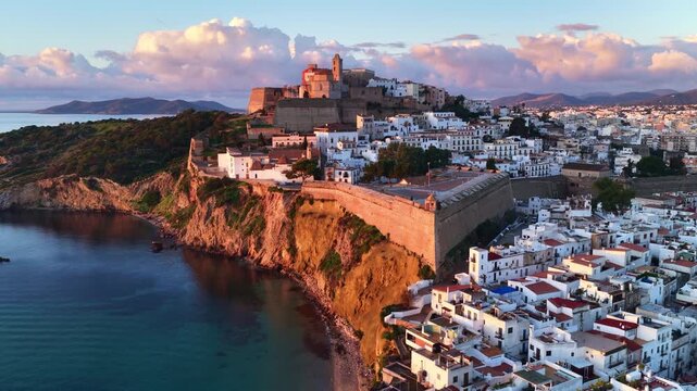 Sunrise aerial view of Eivissa old historic town and fortress on Ibiza island, Balearic Islands, Spain, vacation in Ibiza, travel on Ibiza island