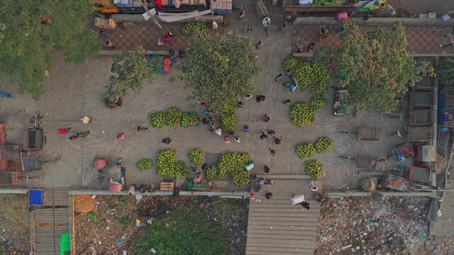 Drone footage of crowded riverside market in Old Dhaka, Bangladesh