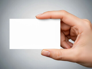Obraz premium A close-up hand holding a blank business card