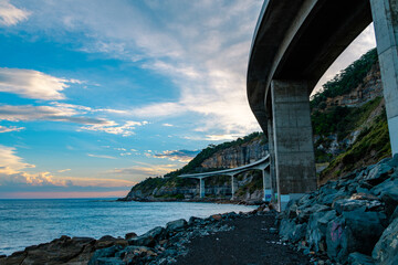 Photo taken at Sea Cliff Bridge in December 2025, showing the iconic coastal bridge and ocean views, with people enjoying walking and sightseeing along the coast.