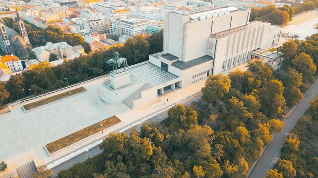Discover the stunning National Monument at Vitkov in Prague during sunrise. This location features an impressive equestrian statue of Jan Zizka atop a hill, surrounded by beautiful views.