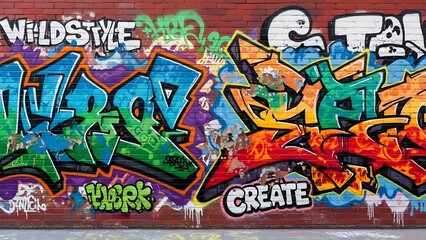 Vibrant urban graffiti wall art with colorful wildstyle lettering and spray paint on a brick background.