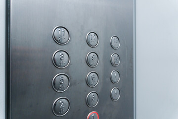 Elevator buttons for floor selection, silver buttons of a large elevator, from the 1st floor to the 13th floor buttons. High quality © Karen Vardanian