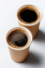 Delicious black coffee and cafe au lait in paper cups, white background 