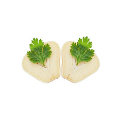 Sliced parsnip with parsley garnish